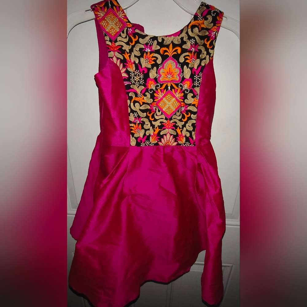 Vibrant Pink Dress with Embroidered Floral Design